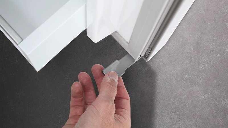 Liebherr RE 1000 — Zarážka dverí